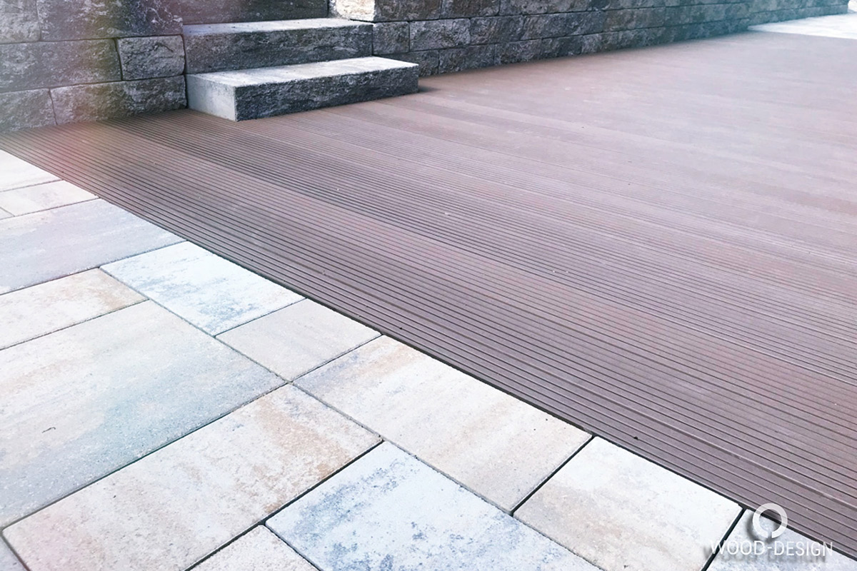 wood-design-referenzen-terrassendeck-aus-wpc-juni-2019-seitlich-boden-mit-treppe.jpg